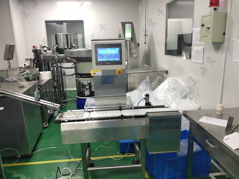 Dynamic Checkweigher - Protection Against Under and Over-Filling