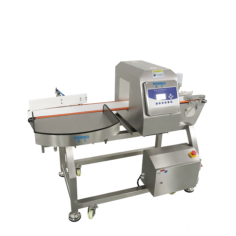 bagged product metal detector with reject system